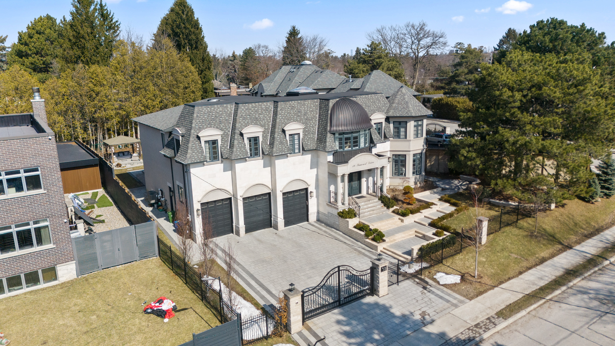 The Bridle Path Toronto luxury estate aerial view, gated multimillion dollar mansion